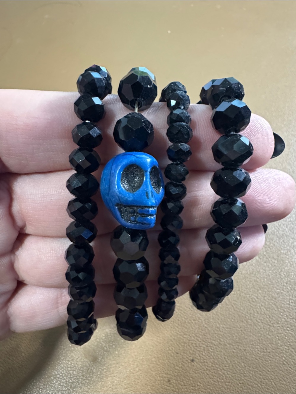 Black Beaded Stretch Bracelet with Blue Skull Accent - Picture 3 of 3
